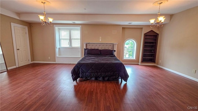 24 Grover St, Auburn, NY 13021 - bedroom featuring a chandelier, wood finished floors, and multiple windows