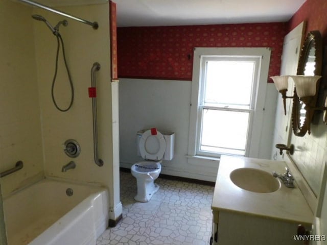 26 Robinson St, Hanover, NY 14136 - full bathroom featuring wallpapered walls, toilet, vanity, bathing tub / shower combination, and baseboards