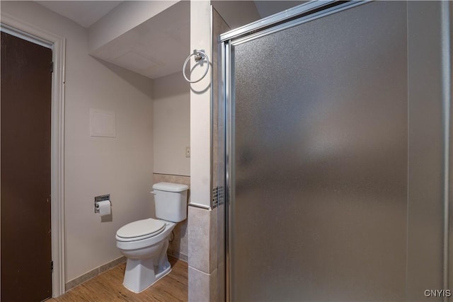 2795 State Route 12b, Marshall, NY 13328 - full bathroom featuring toilet, a stall shower, and wood finished floors