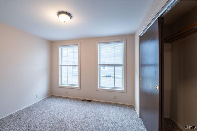 2795 State Route 12b, Marshall, NY 13328 - unfurnished bedroom with carpet flooring, baseboards, and a closet