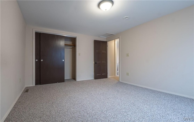 2795 State Route 12b, Marshall, NY 13328 - unfurnished bedroom featuring carpet flooring, a closet, and baseboards