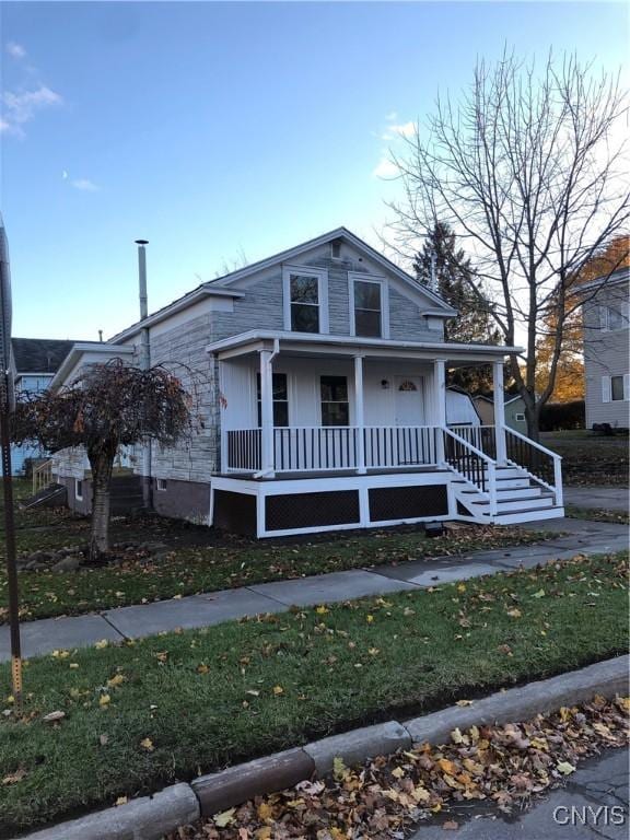 150 E Seneca St, Oswego-City, NY 13126 - bungalow-style house featuring a porch