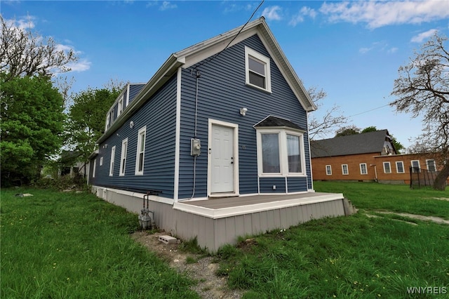 65 Kingsley St, Buffalo, NY 14208 - view of side of home with a yard