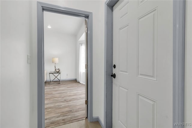 65 Kingsley St, Buffalo, NY 14208 - hallway with baseboards and light wood-style flooring