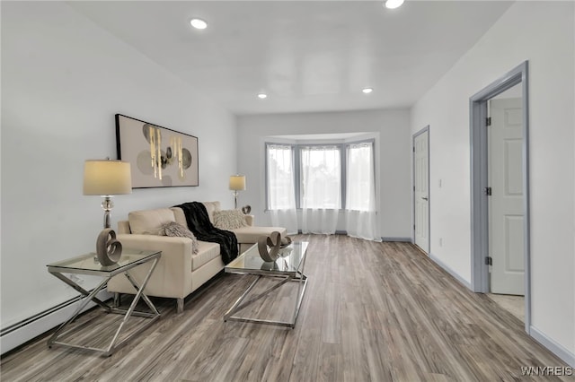 65 Kingsley St, Buffalo, NY 14208 - living room with wood finished floors, recessed lighting, and baseboards