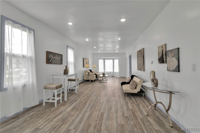 65 Kingsley St, Buffalo, NY 14208 - sitting room with wood finished floors, recessed lighting, and baseboards