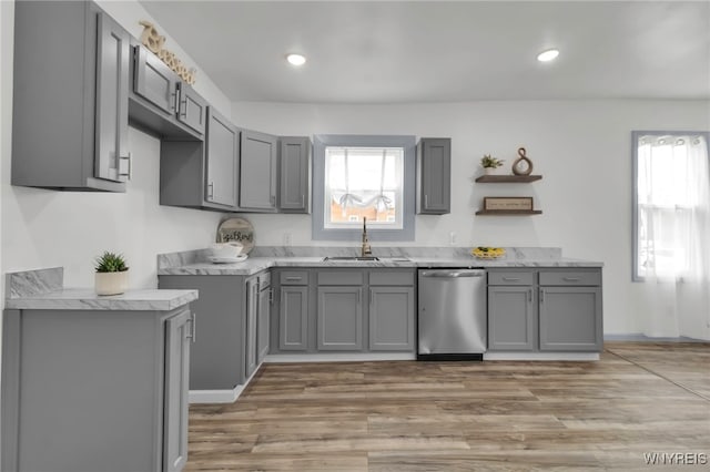 65 Kingsley St, Buffalo, NY 14208 - kitchen with stainless steel dishwasher, gray cabinetry, a sink, healthy amount of natural light, and recessed lighting