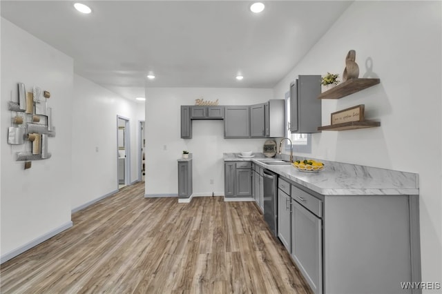 65 Kingsley St, Buffalo, NY 14208 - kitchen with gray cabinets, open shelves, light countertops, light wood finished floors, and a sink