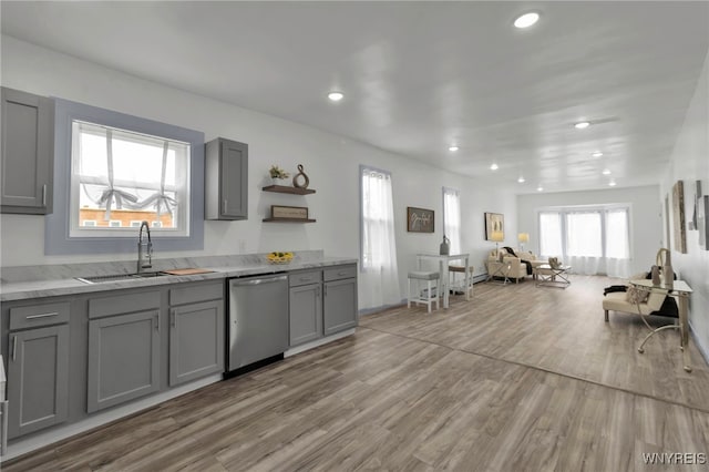 65 Kingsley St, Buffalo, NY 14208 - kitchen featuring gray cabinetry, stainless steel dishwasher, a sink, wood finished floors, and recessed lighting