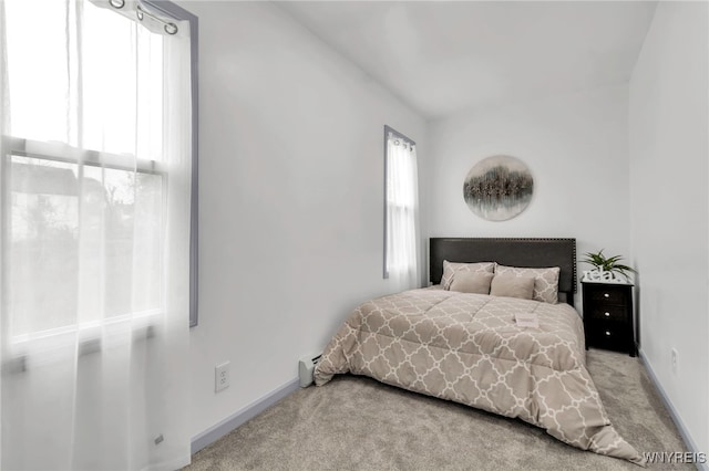 65 Kingsley St, Buffalo, NY 14208 - bedroom with light colored carpet and baseboards