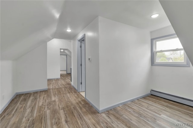 65 Kingsley St, Buffalo, NY 14208 - bonus room featuring light wood-type flooring, a baseboard radiator, recessed lighting, lofted ceiling, and baseboards