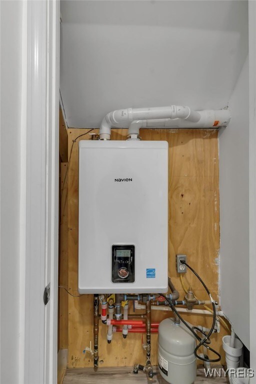 65 Kingsley St, Buffalo, NY 14208 - utility room featuring tankless water heater