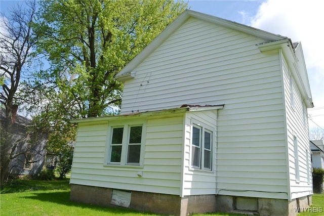 584 E Ave, Shelby, NY 14103 - view of property exterior with a lawn