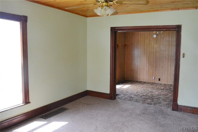 584 E Ave, Shelby, NY 14103 - carpeted empty room with ceiling fan, baseboards, and wooden ceiling