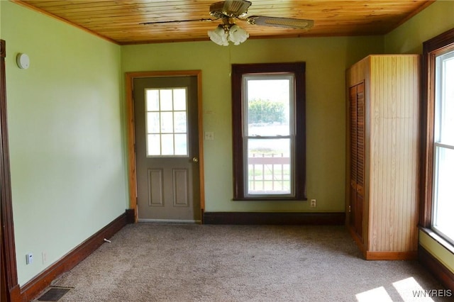 584 E Ave, Shelby, NY 14103 - entryway featuring wooden ceiling, baseboards, light carpet, and a ceiling fan