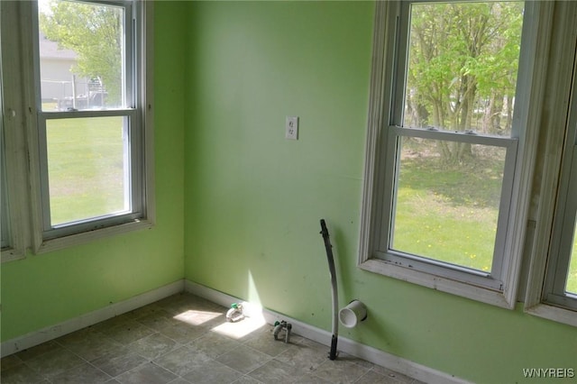 584 E Ave, Shelby, NY 14103 - empty room featuring baseboards