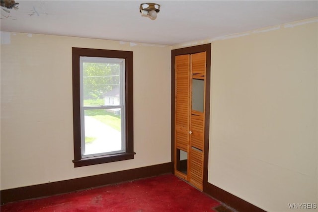 584 E Ave, Shelby, NY 14103 - unfurnished bedroom with a closet and baseboards