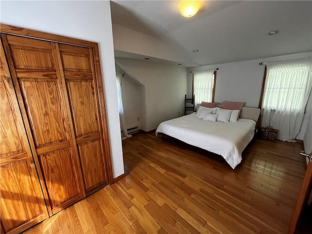 200 Torsten Ln, Davenport, NY 13750 - bedroom featuring vaulted ceiling, light wood finished floors, and a baseboard radiator