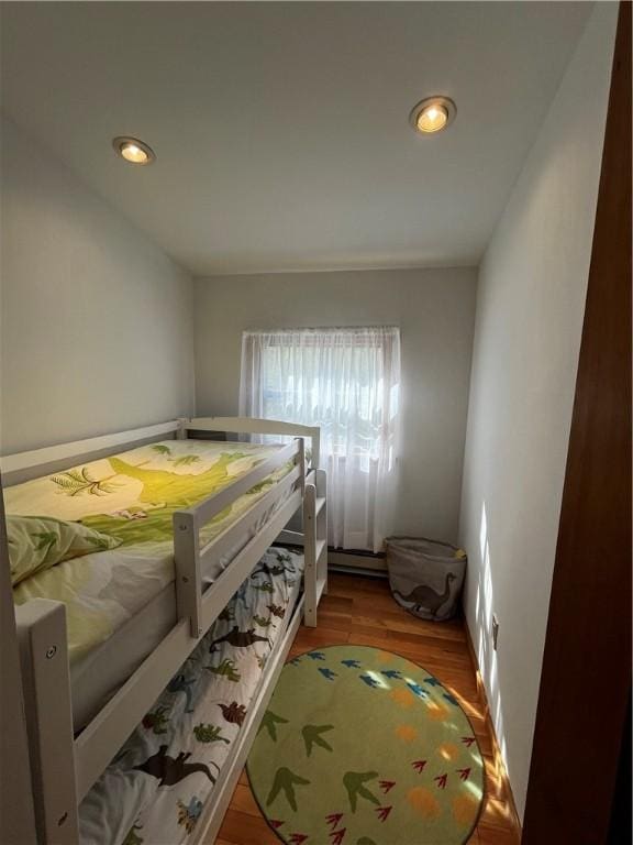 200 Torsten Ln, Davenport, NY 13750 - bedroom featuring wood finished floors, recessed lighting, a baseboard radiator, and baseboards