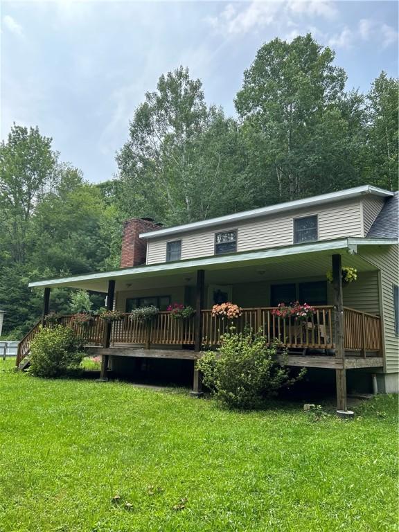 200 Torsten Ln, Davenport, NY 13750 - country-style home with a front yard and a chimney