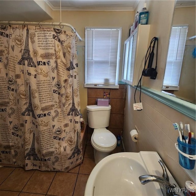 93 Austin St, Buffalo, NY 14207 - full bath with a sink, tile patterned floors, tile walls, crown molding, and toilet