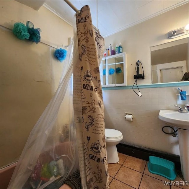 93 Austin St, Buffalo, NY 14207 - full bathroom with tile patterned flooring, tile walls, crown molding, curtained shower, and toilet