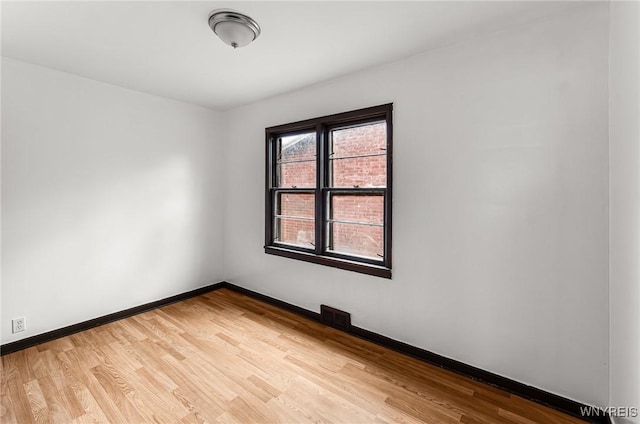 414 18th St, Niagara Falls, NY 14303 - spare room with light wood-style flooring and baseboards