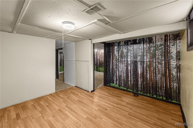 414 18th St, Niagara Falls, NY 14303 - spare room featuring wood finished floors and a textured ceiling