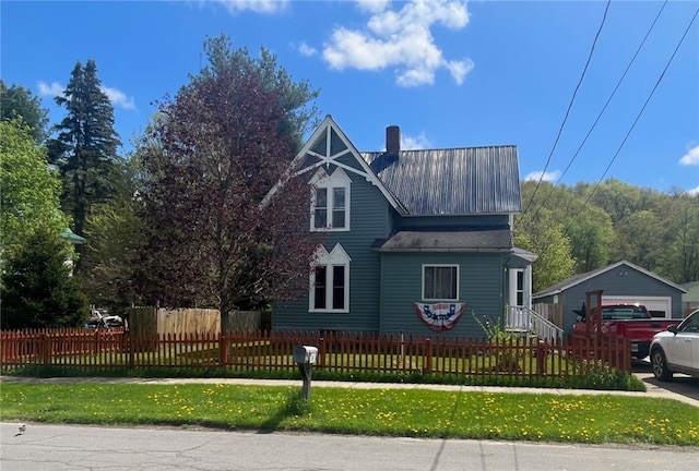 8 S St, Friendship, NY 14739 - view of front facade featuring a chimney and a garage