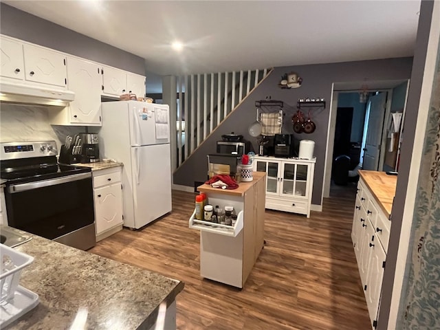8 S St, Friendship, NY 14739 - kitchen with stainless steel range with electric cooktop, under cabinet range hood, freestanding refrigerator, dark wood-style floors, and white cabinetry