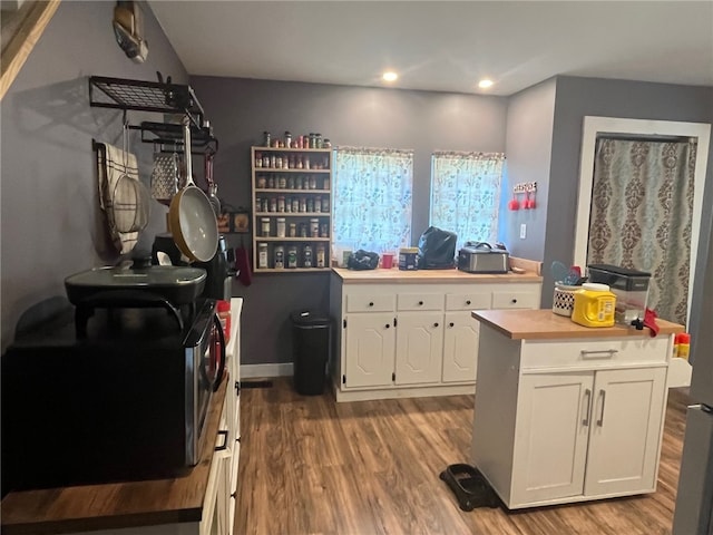 8 S St, Friendship, NY 14739 - kitchen featuring light wood finished floors, white cabinets, and recessed lighting
