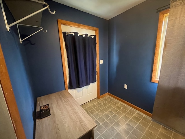 8 S St, Friendship, NY 14739 - unfurnished bedroom with tile patterned floors and baseboards