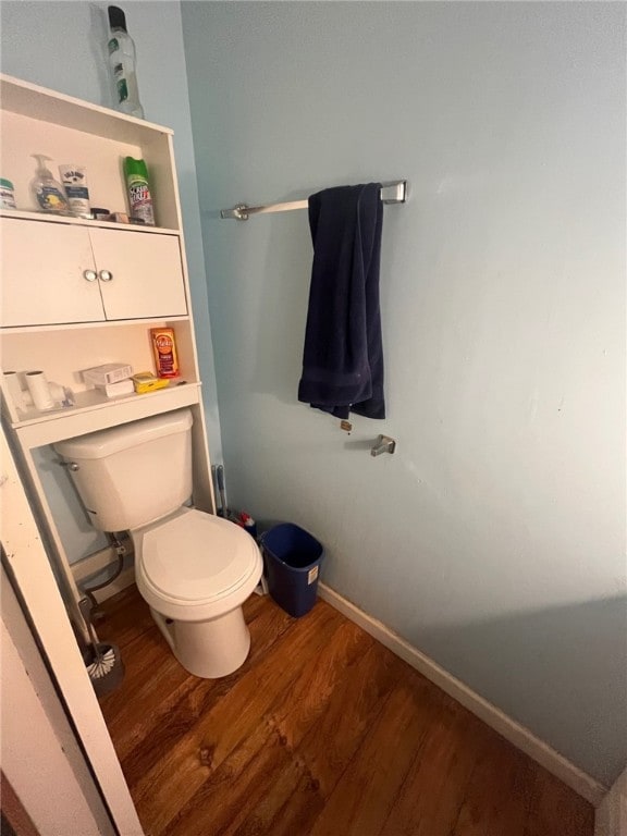 8 S St, Friendship, NY 14739 - bathroom featuring wood finished floors, toilet, and baseboards