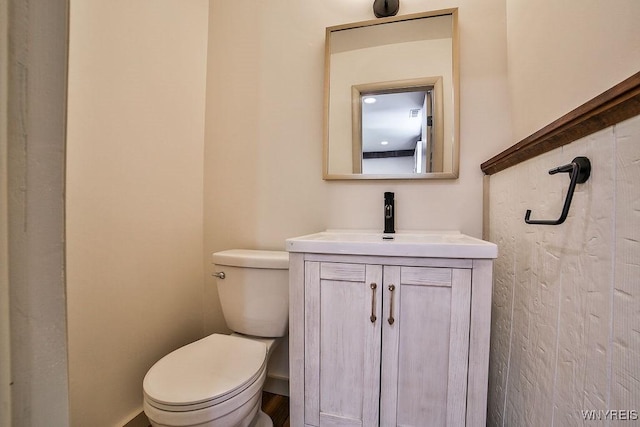 7025 Academy Ln, Lockport-Town, NY 14094 - bathroom with toilet, vanity, and baseboards