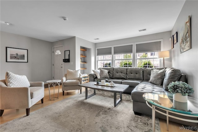 living area with wood finished floors