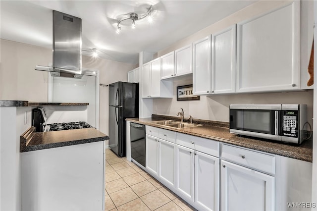 kitchen with a sink, black appliances, dark countertops, white cabinetry, and light tile patterned floors