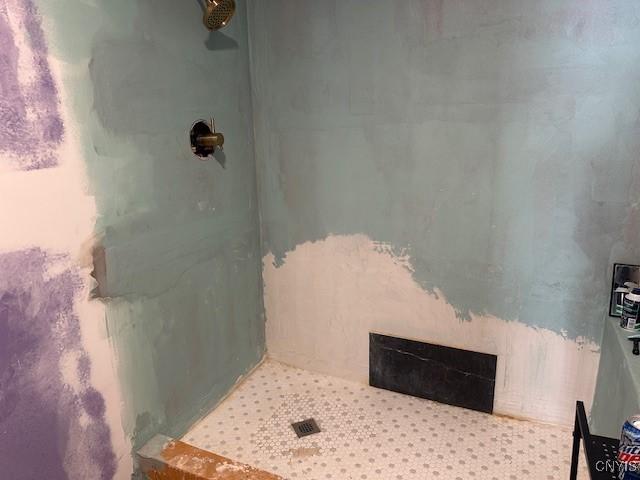 bathroom featuring a shower