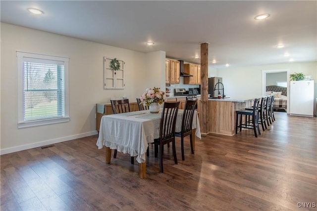 30622 Vanalstyne Rd, Clayton, NY 13622 - dining space featuring dark wood-style flooring, recessed lighting, and baseboards