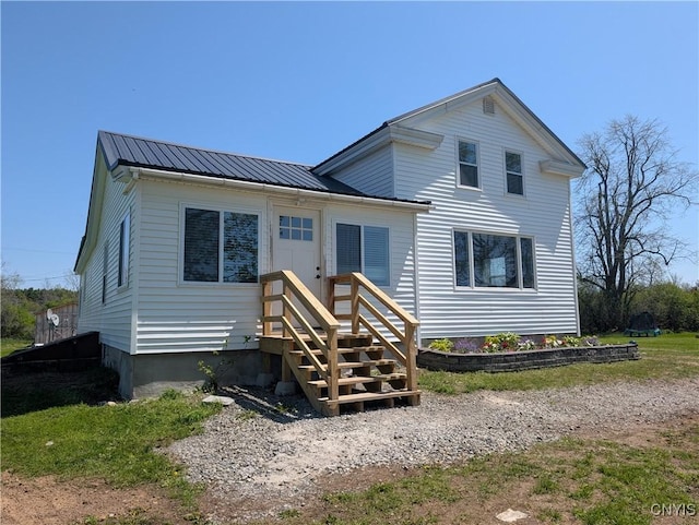 30622 Vanalstyne Rd, Clayton, NY 13622 - back of house featuring metal roof