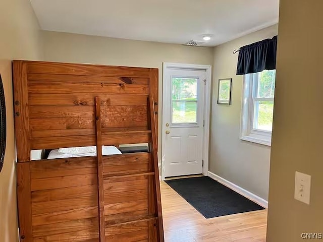 179 E Lake Rd, Deruyter, NY 13052 - entryway featuring wood finished floors and baseboards