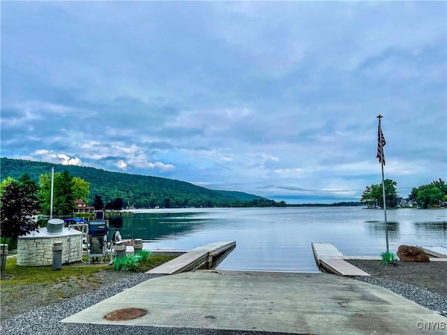 179 E Lake Rd, Deruyter, NY 13052 - dock featuring a boat ramp and a water view
