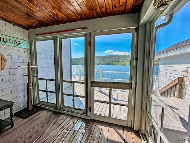 179 E Lake Rd, Deruyter, NY 13052 - entryway featuring a water view, wooden ceiling, and hardwood / wood-style flooring