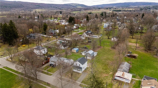 aerial view of property's location with nearby suburban area