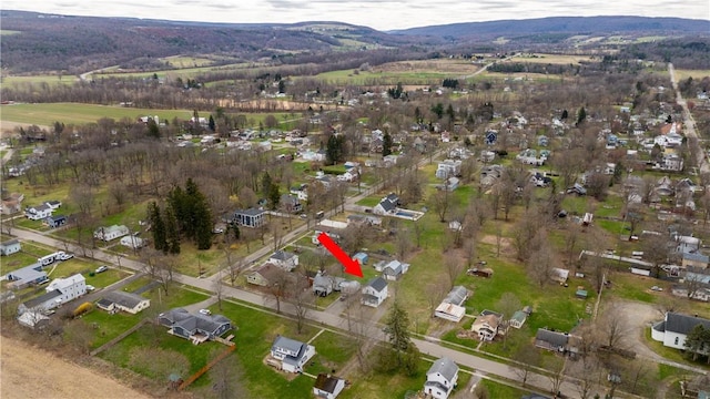 aerial overview of property's location with nearby suburban area