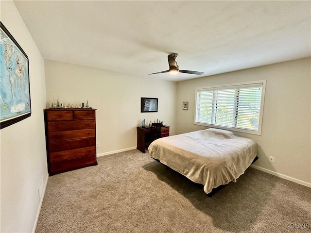 bedroom featuring carpet, baseboards, and ceiling fan