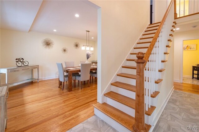28 Lakeview Cir, Skaneateles, NY 13152 - stairway with recessed lighting, wood finished floors, and baseboards