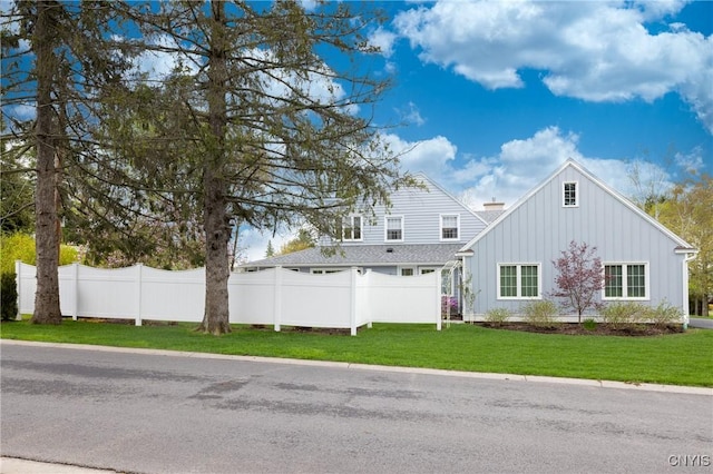 28 Lakeview Cir, Skaneateles, NY 13152 - view of front of home with board and batten siding