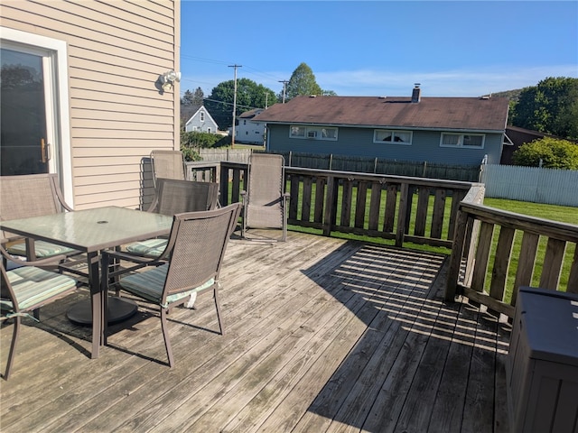 181 Dwight Ave, Corning-City, NY 14830 - wooden terrace featuring outdoor dining area and a fenced backyard