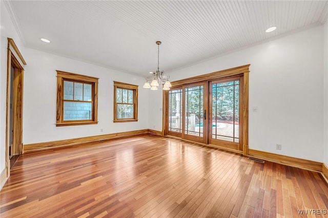148 Mullen St, Tonawanda-City, NY 14150 - unfurnished dining area featuring a chandelier, baseboards, light wood-type flooring, and recessed lighting
