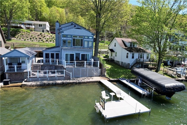 177 E Lake Rd, Deruyter, NY 13052 - dock area featuring a deck with water view and boat lift